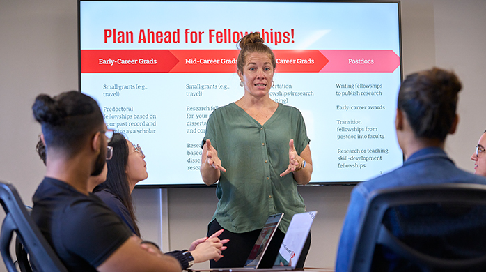 Professor teaches to group of students