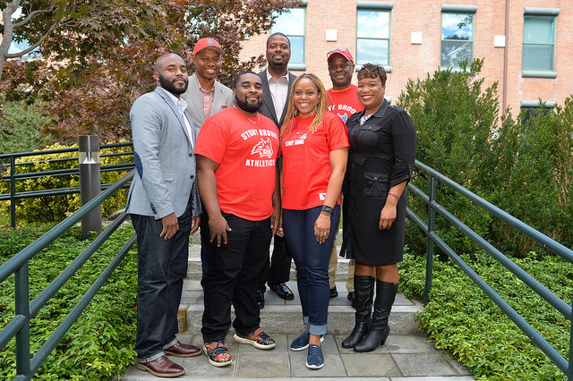 Group of Alumni smiling