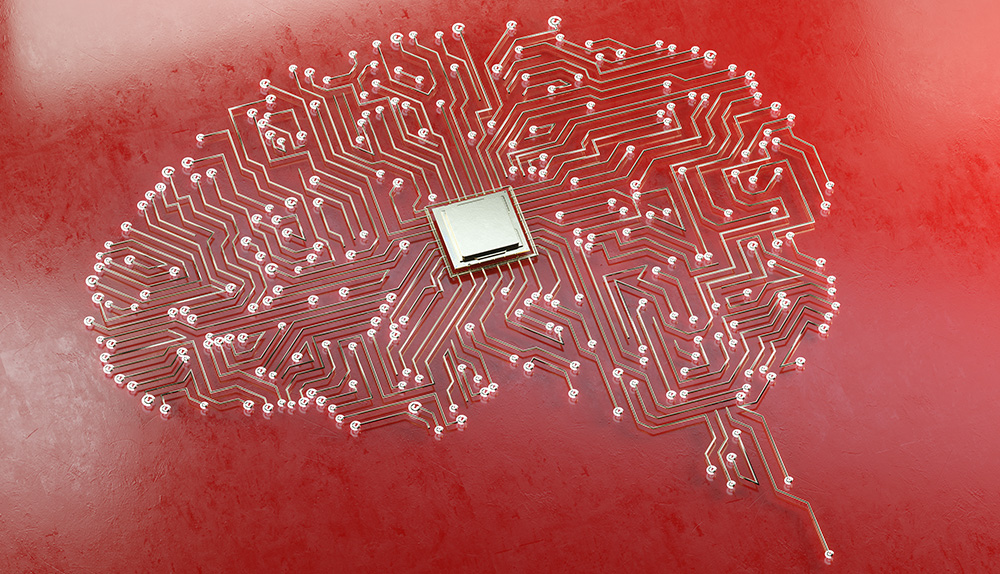 Circuit board shaped as a brain against a red background.