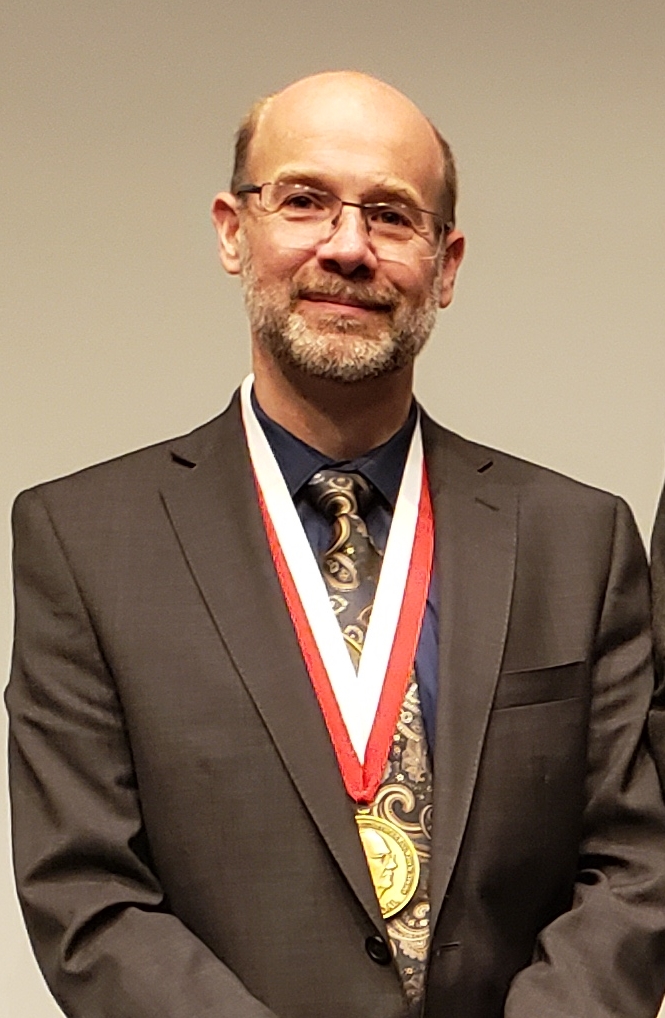 Headshot of Dean C. Adams
