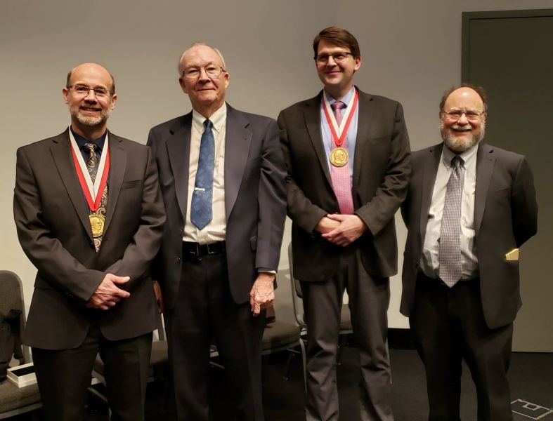 Group photograph of Adams, F. James Rohlf, Hallgrimsson, and Bookstein