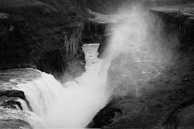 black and white photo of top of waterfall