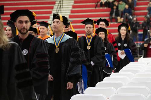 faculty and students dressed in regalia