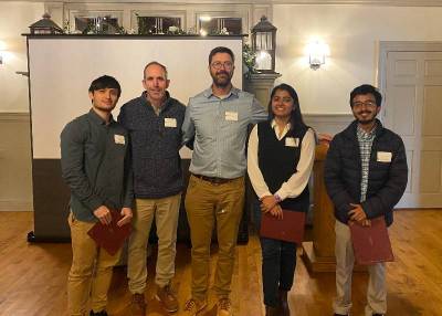 Professors and students at poster award reception
