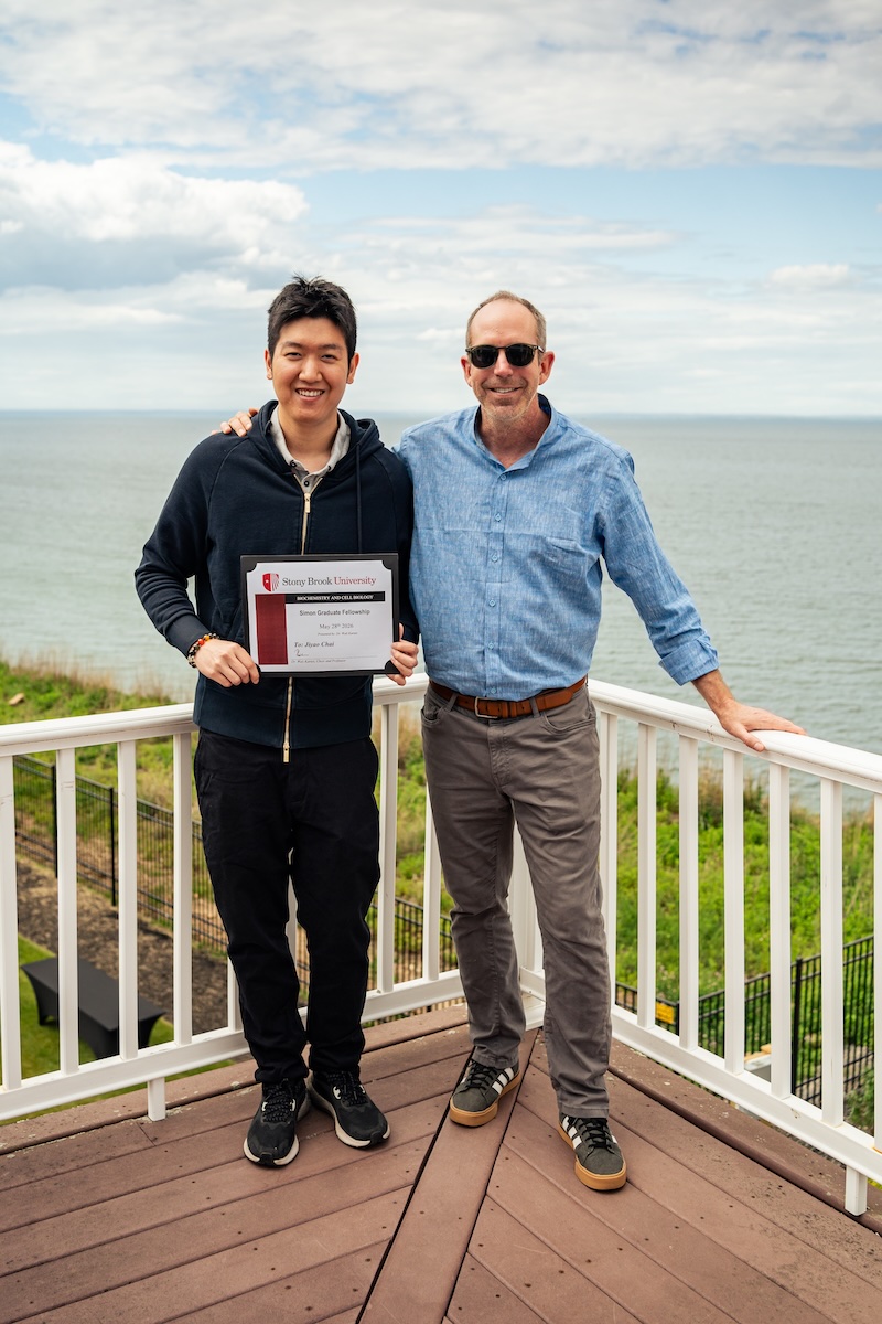 Jiyao Chai and Mike Airola two men standing on a deck