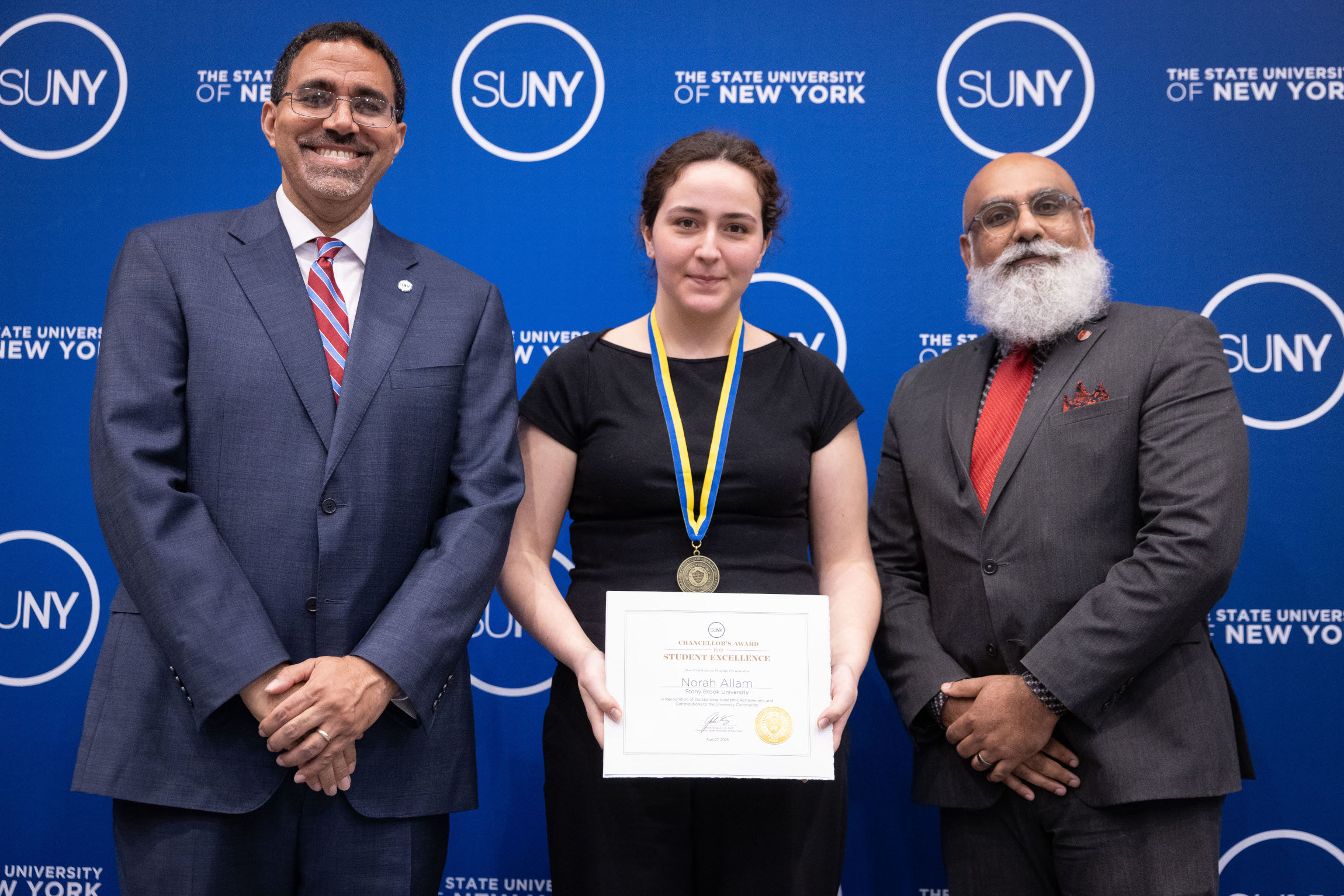 Norah Allam receiving an award
