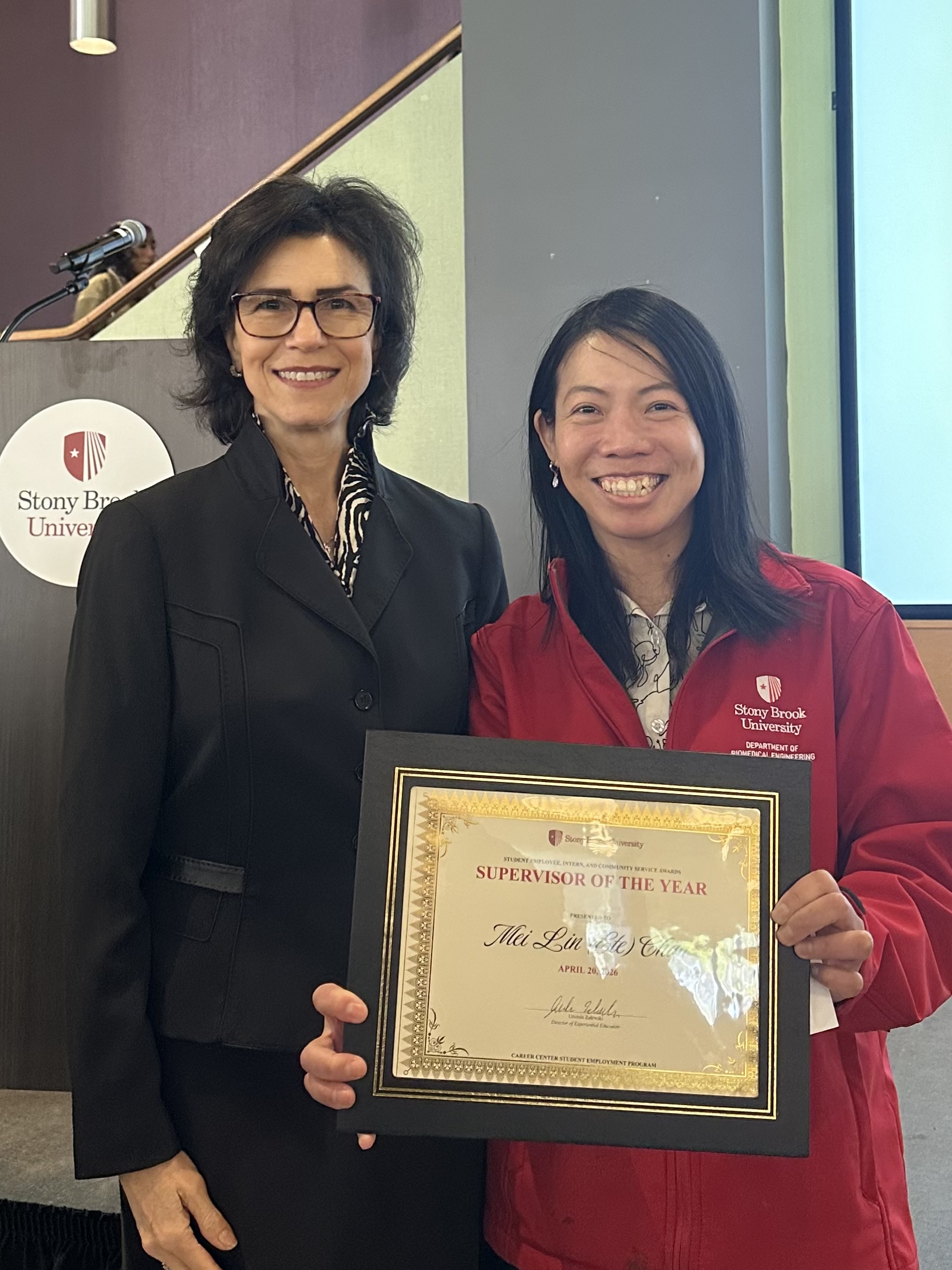 Dr. Chan receiving an award