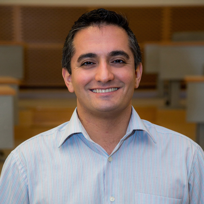 Dr. Arbab smiling