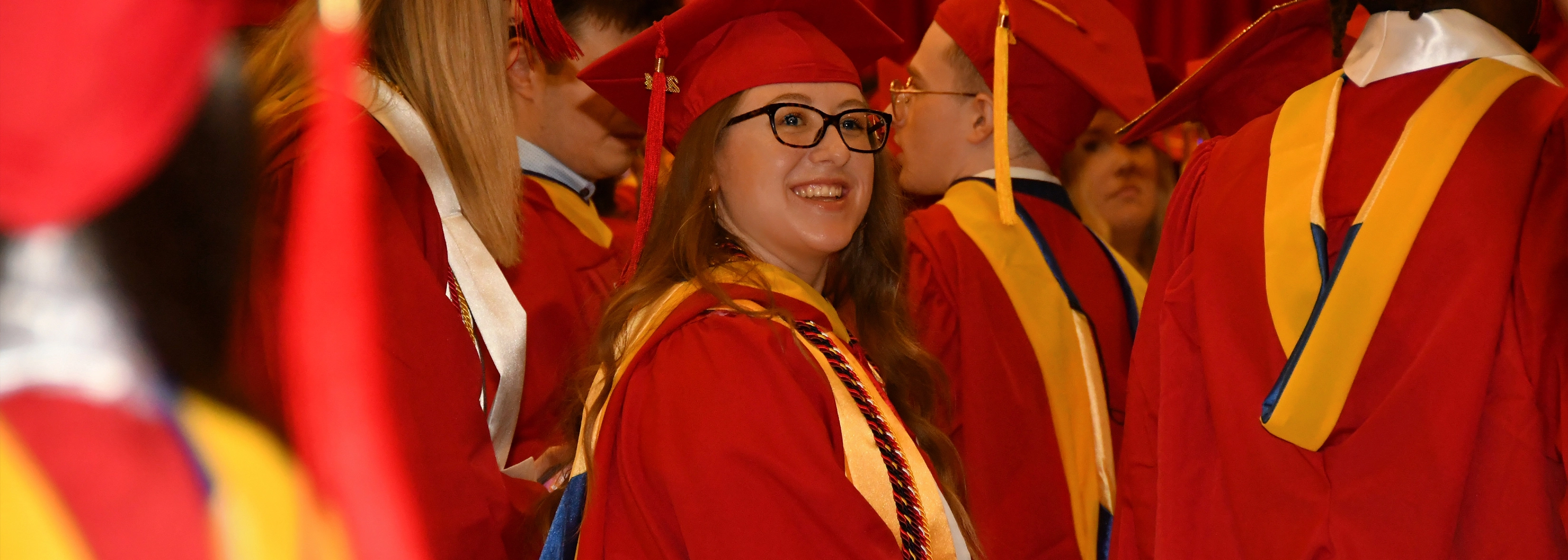 a student at convocation in regalia