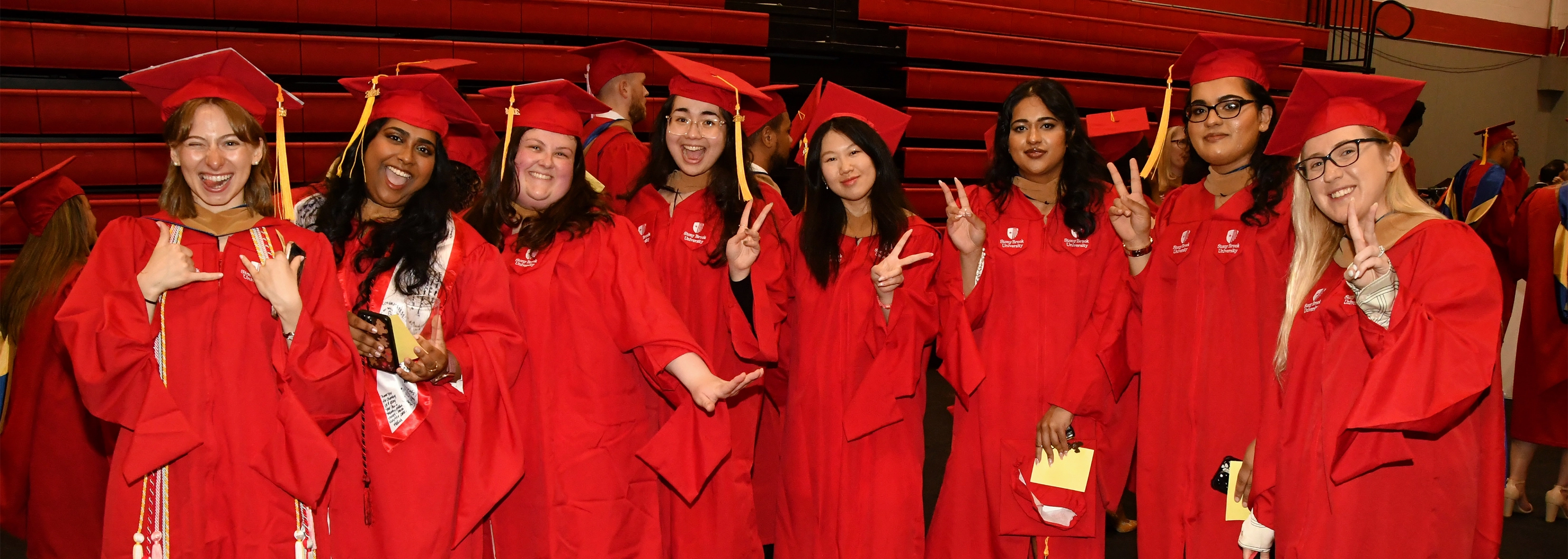 students in regalia at convocation