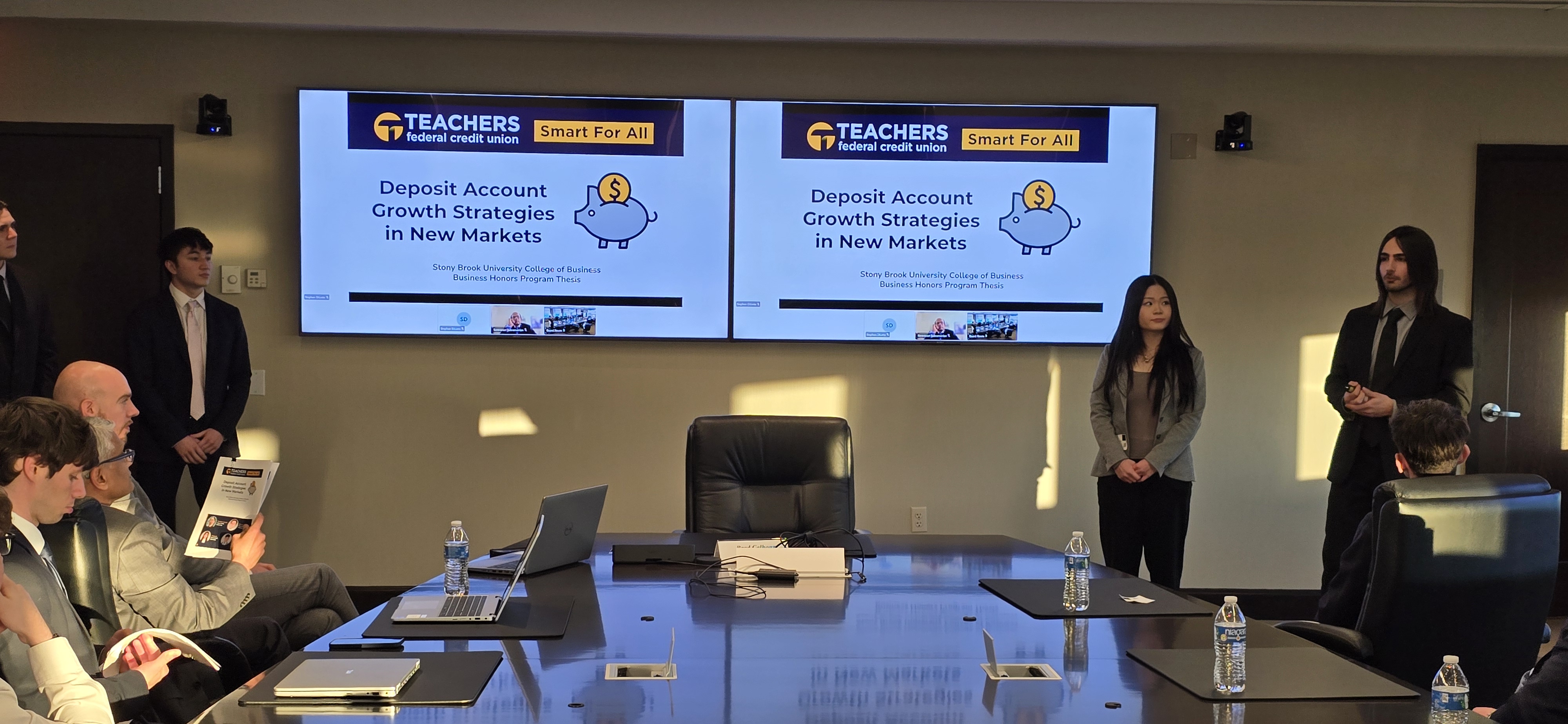 students presenting at Teachers Federal Credit Union