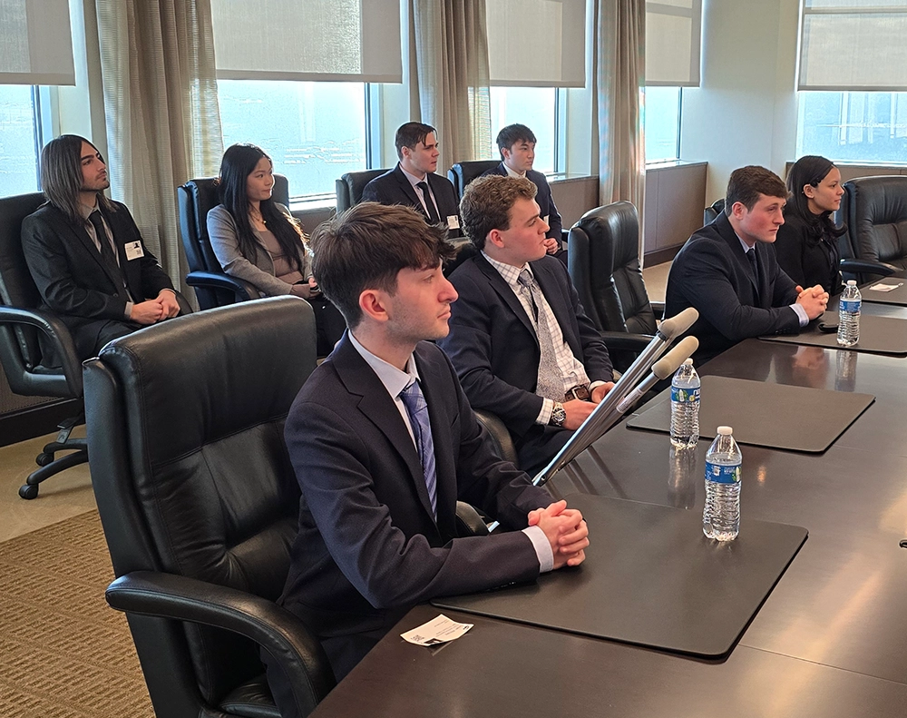 students sitting in boardroom