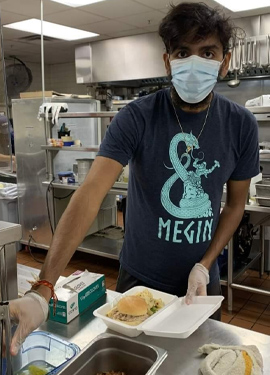 Yashasvi volunteering in kitchen