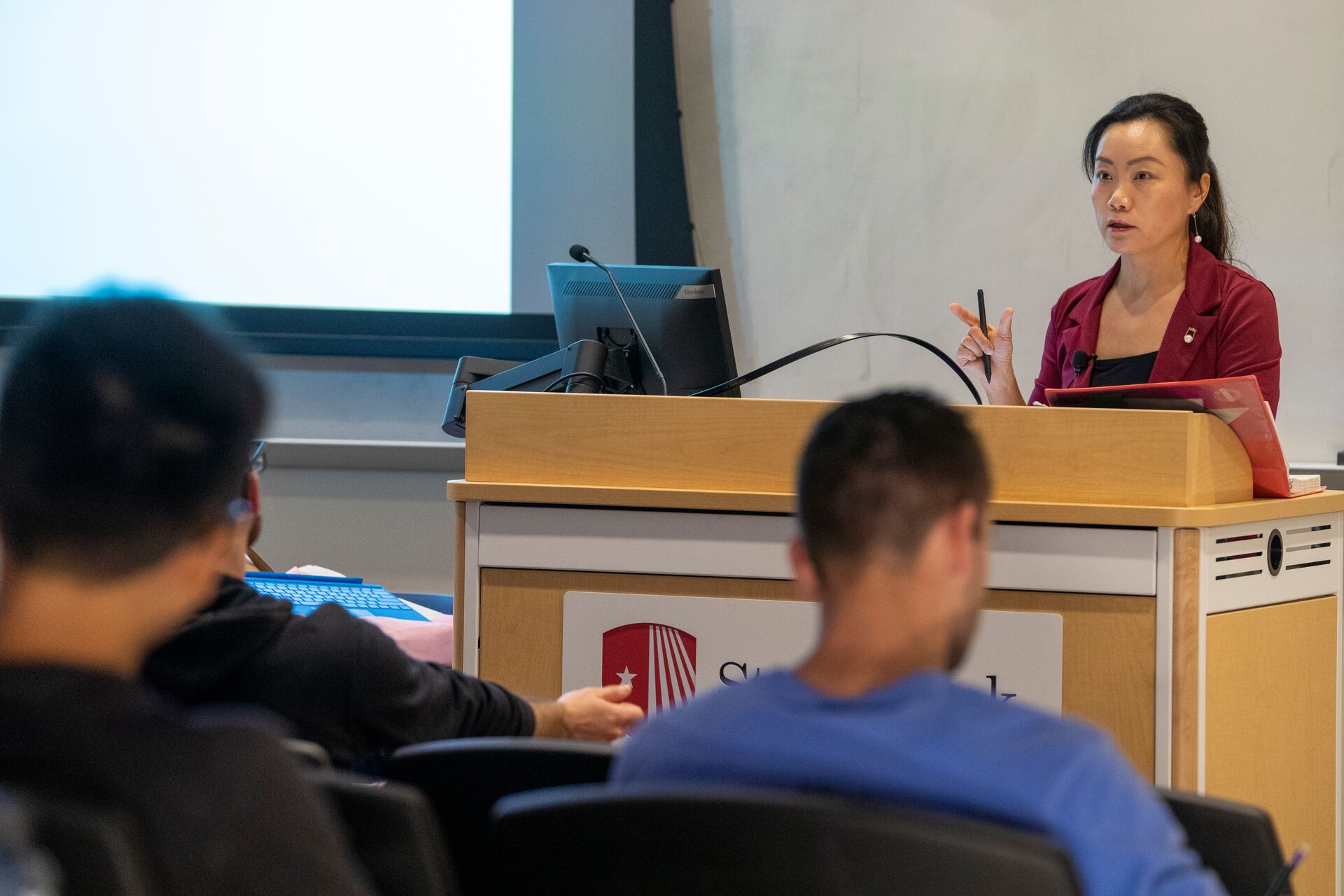 Professor lecturing in a classroom