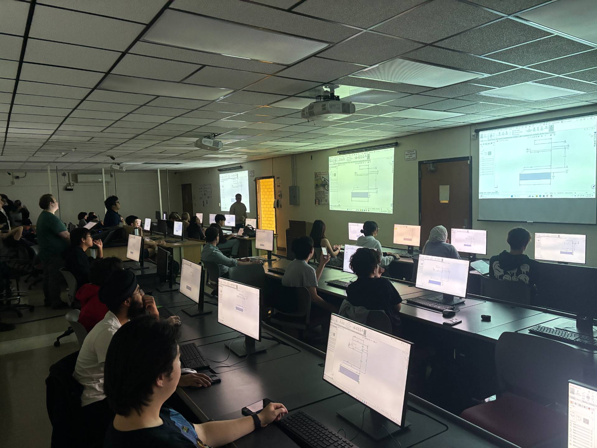 Students using computers in a lab.