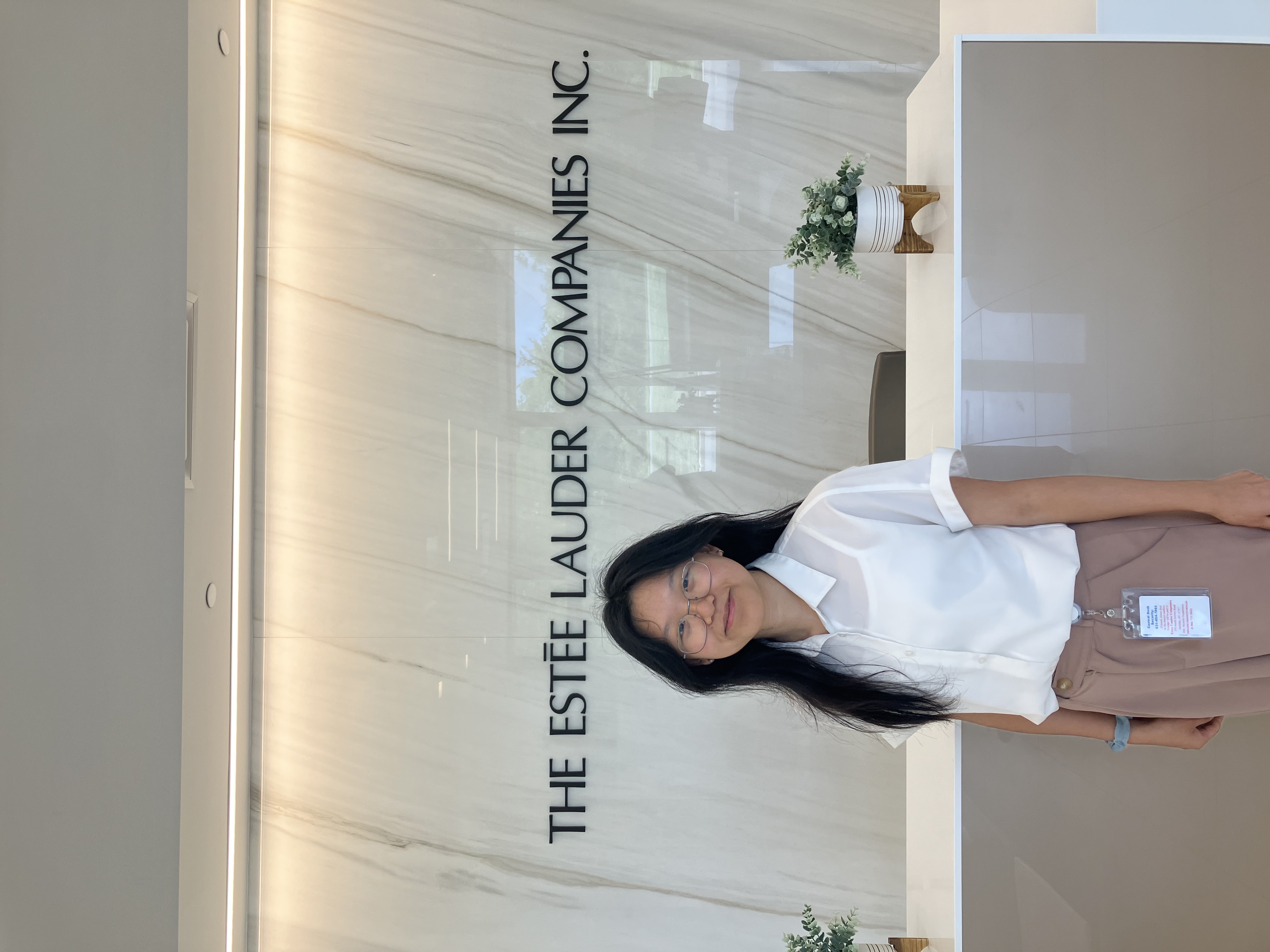 Anita Wang smiling for a professional photo