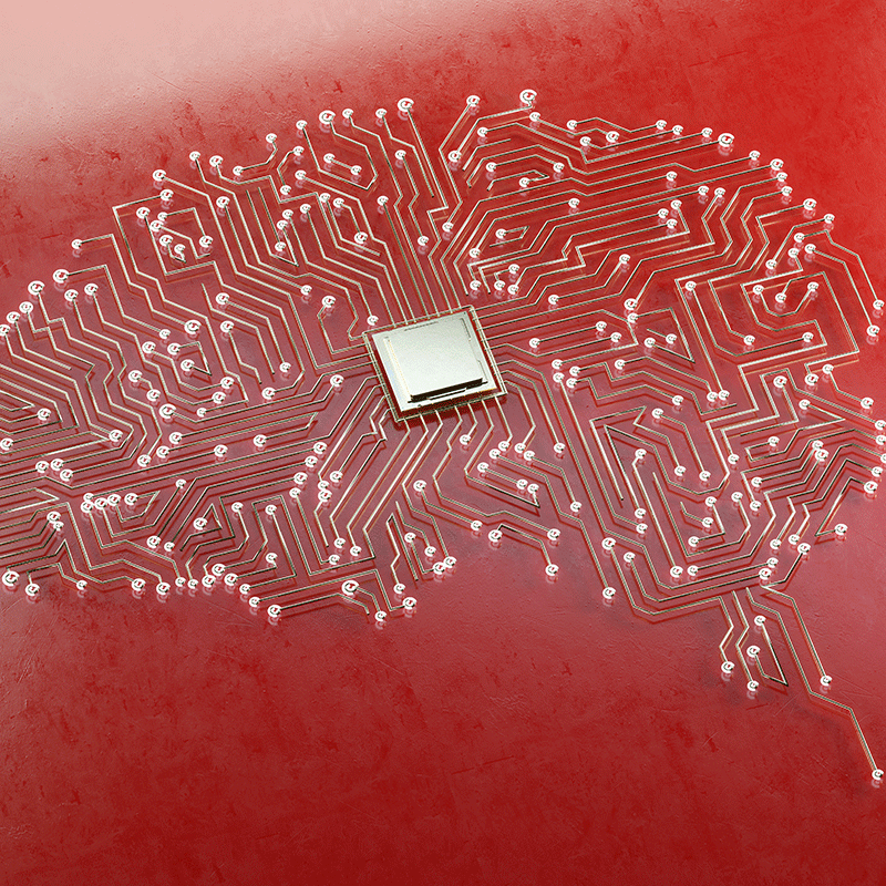 Illustration of a brain shape traced with gold circuit lines on a red background, featuring a central square chip, symbolizing artificial intelligence.