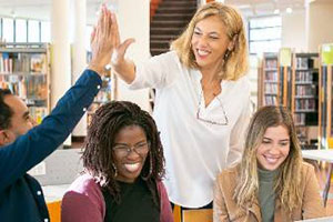 diverse students in a library