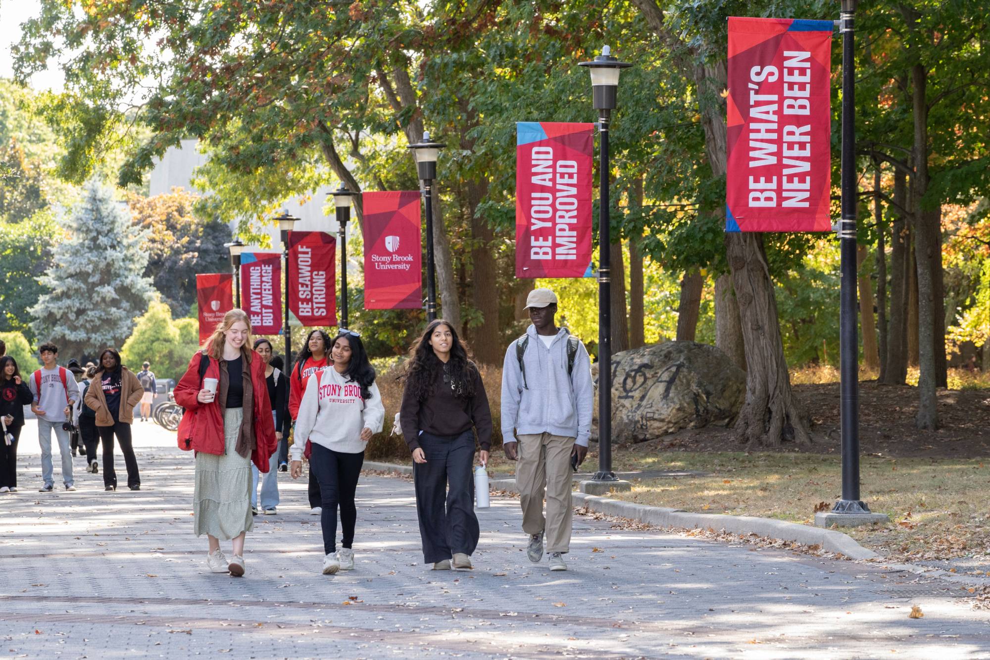 students walking together on campus while talking