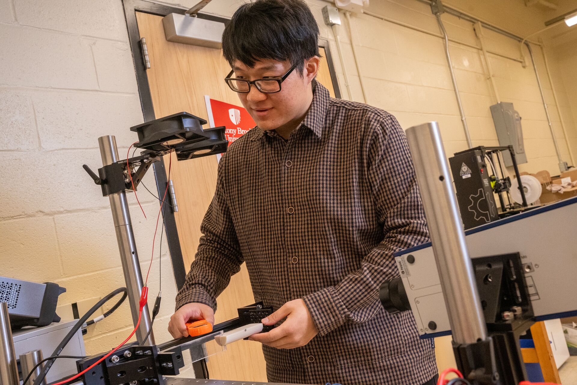 David Xiedeng working in the lab