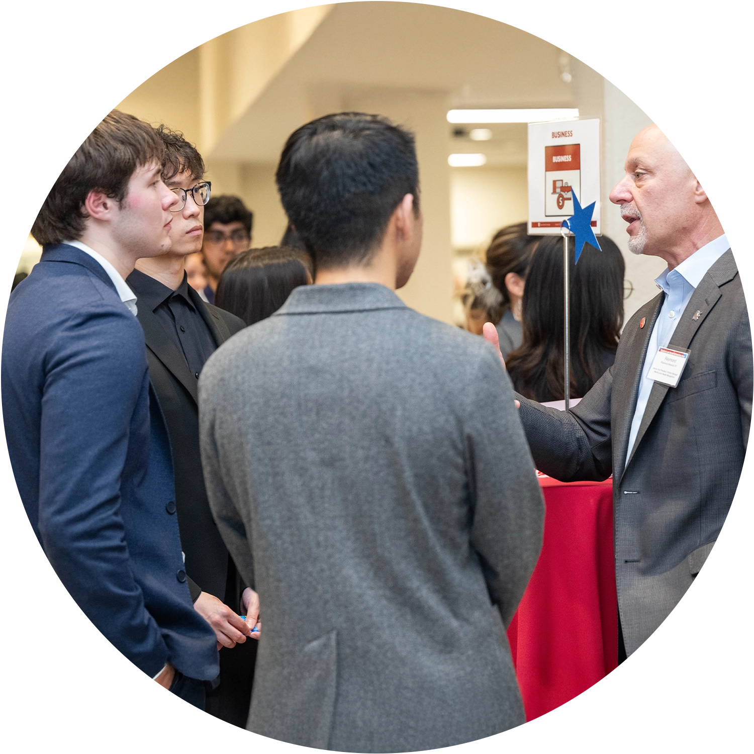 SUNY Stony Brook University College of Business Graduate Students Attending an Event and Networking