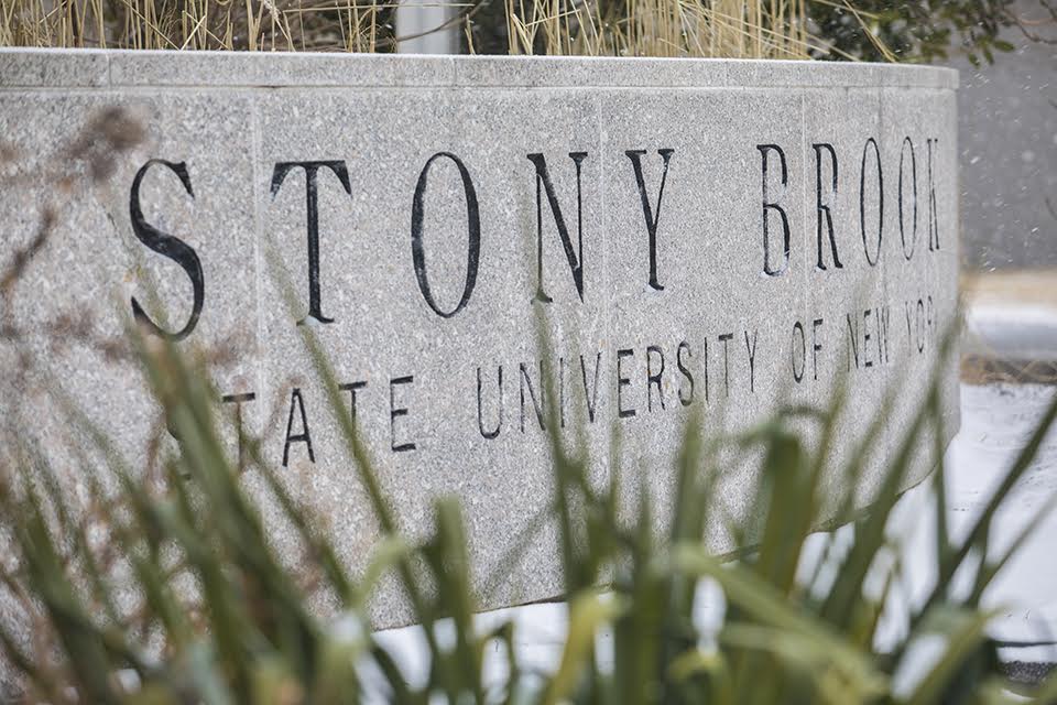 SBU stone sign at campus entrance