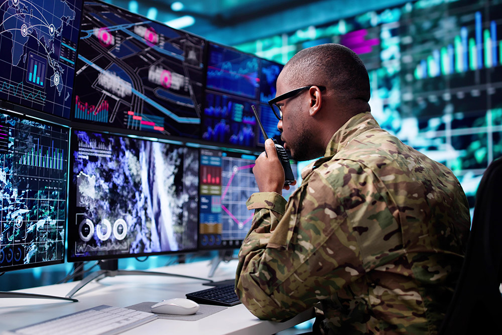 US Army Personnel Looking at Surveillance Data