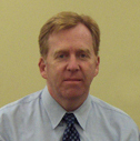 headshot of Terence Harrigan