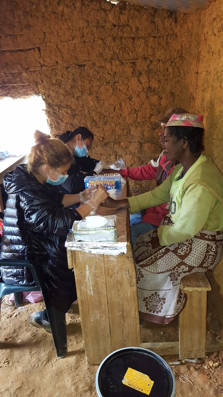 lee and koeun taking blood samples