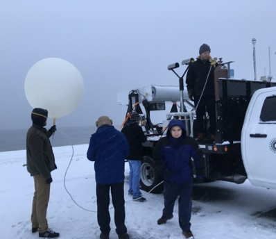 Students conducting research with the radar truck