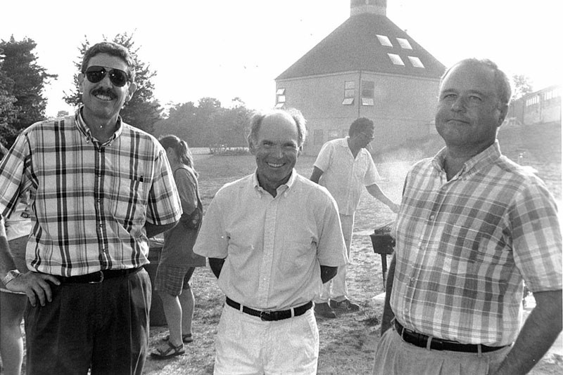 Lewis Greenstein, dean of the Friends World Program, faculty member Larry Liddle and an unidentified man at a barbecue celebrating the start of the 1995 academic year.