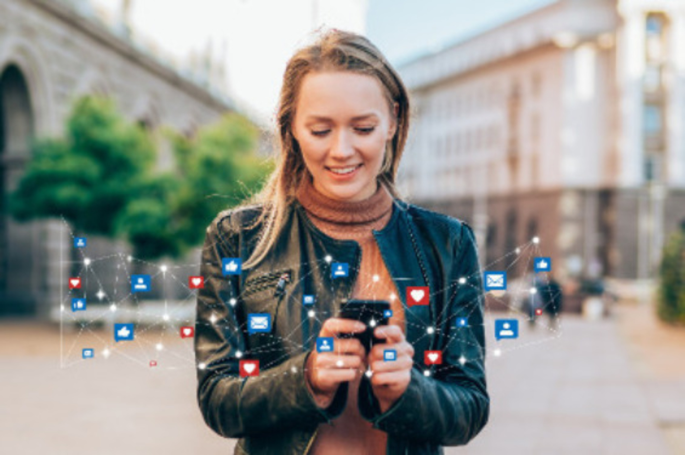 women with mobile phone that is connected to online applications
