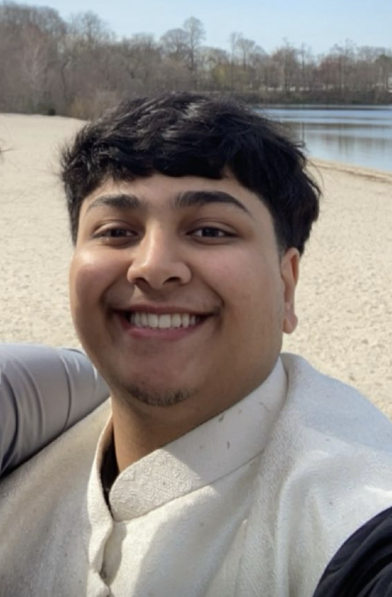 Photo of a student smiling.
