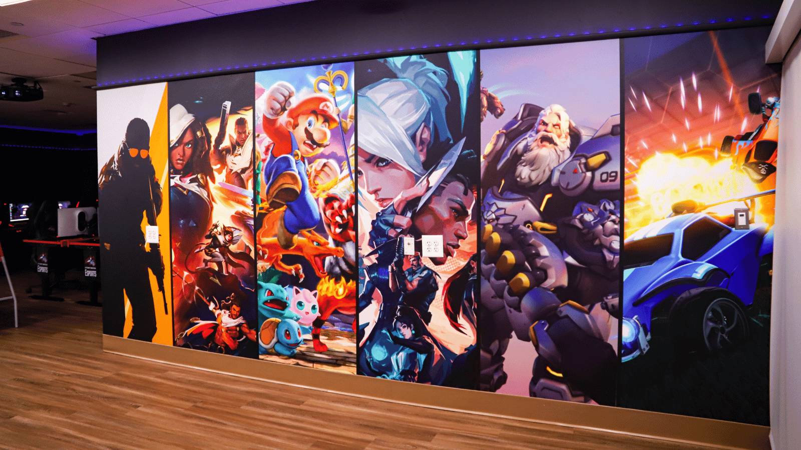 Mural of various games in the esports room