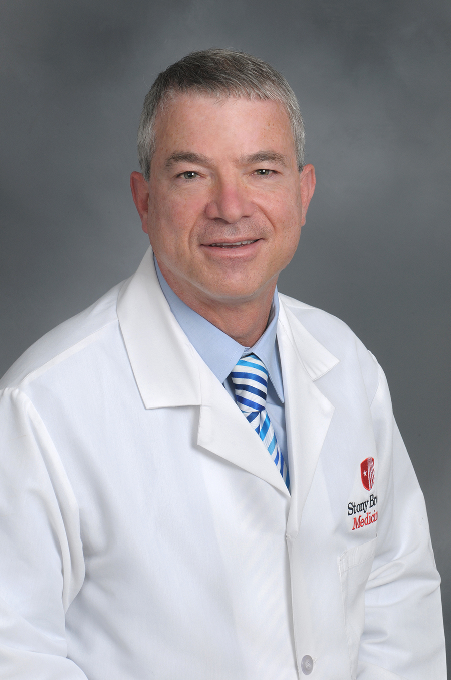 Adam J. Singer