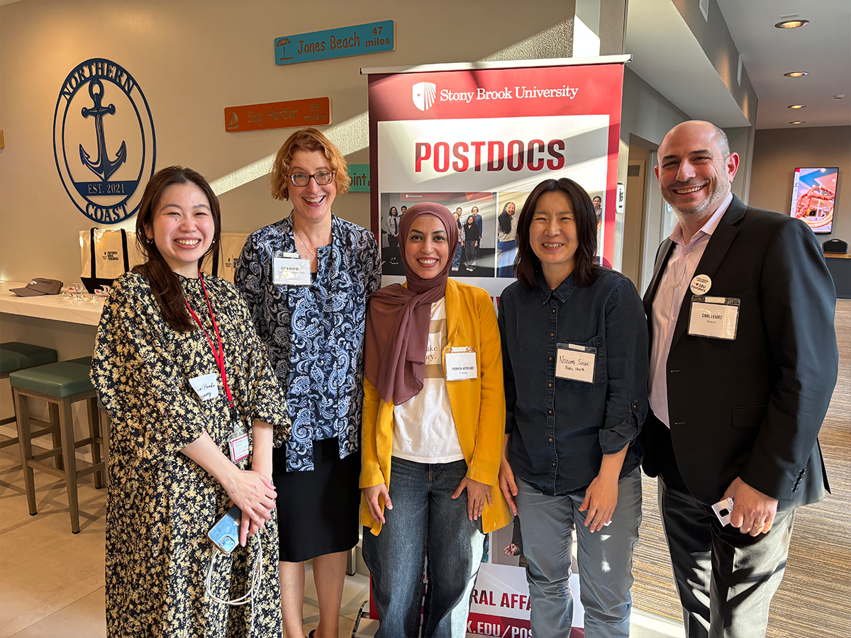 Dean of the Graduate School with Provost and Postdocs for National Postdoc Appreication Week