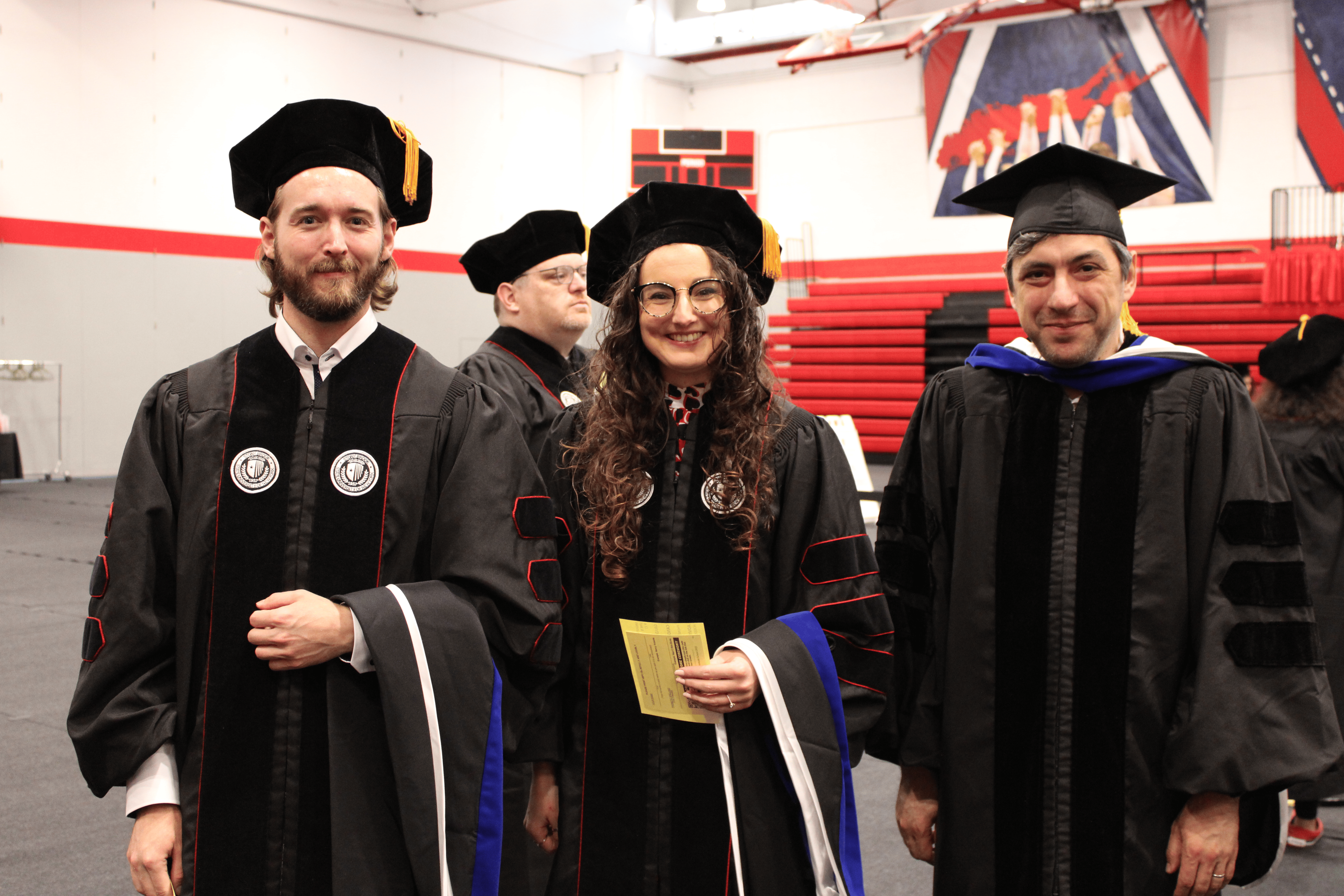 Graduates at Doctoral Hooding Ceremony