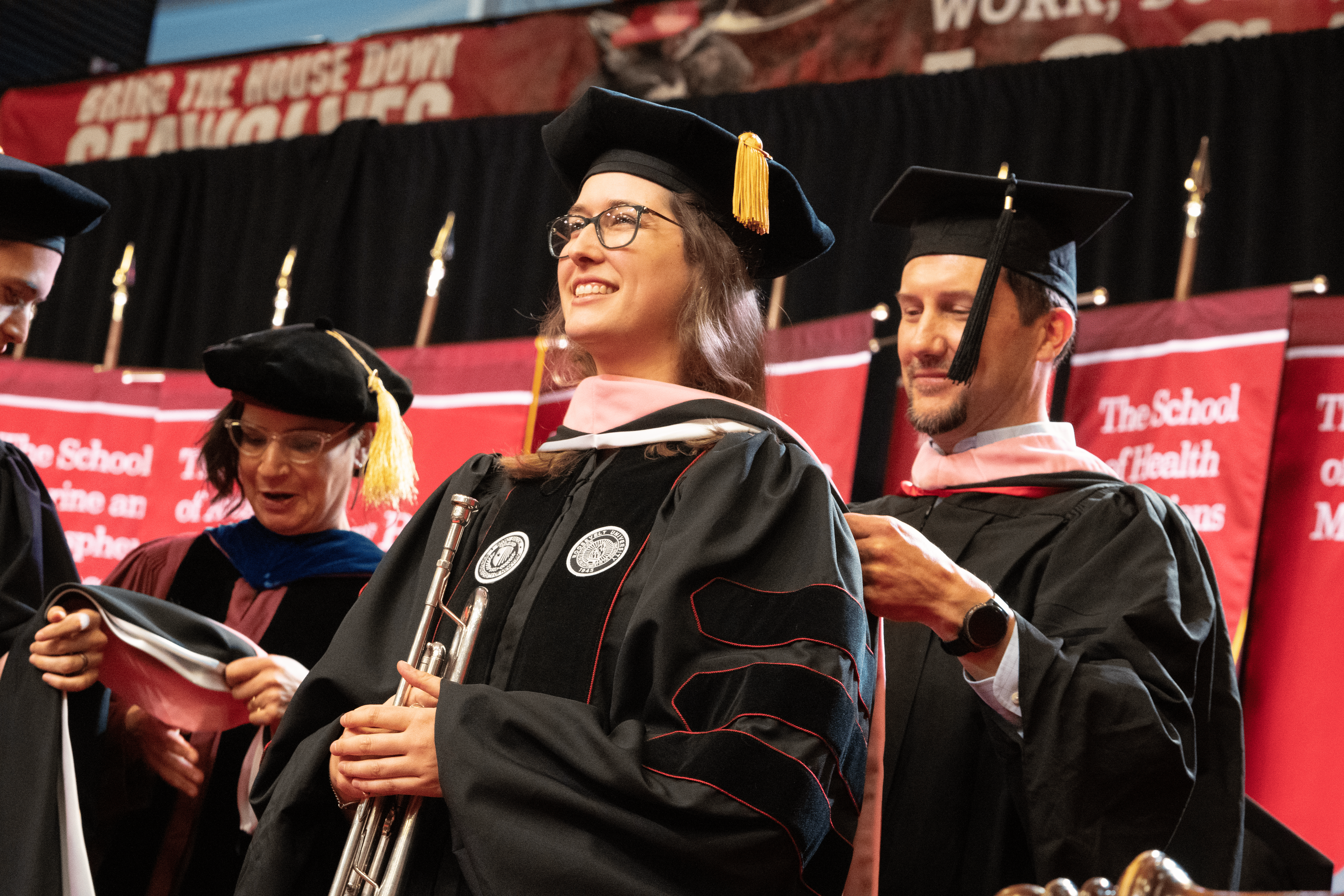 Graduates at Doctoral Hooding Ceremony