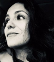 Headshot of Lena Burgos-Lafuente