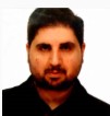 Headshot of Moises Hassan