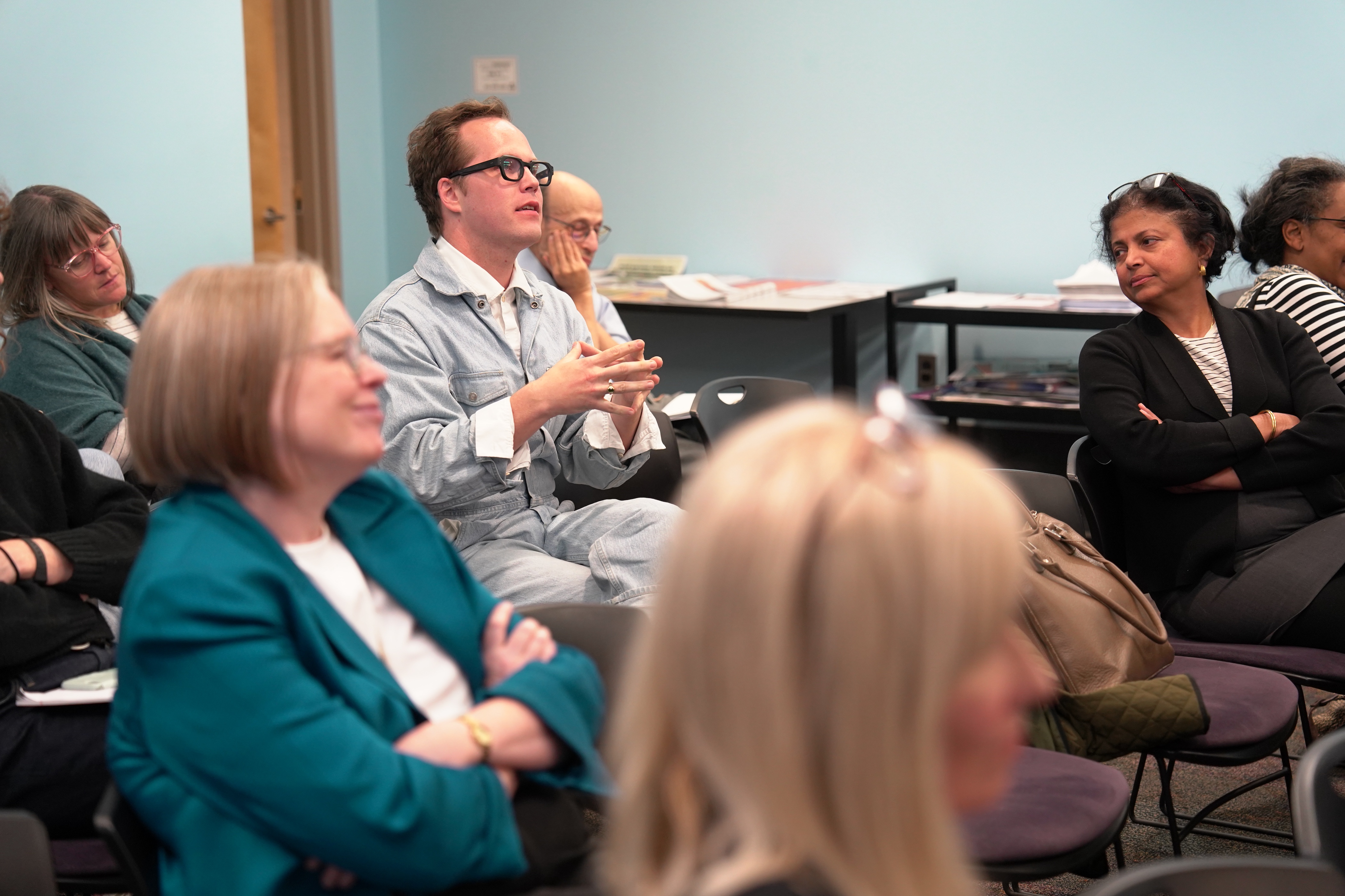 DWR Professor Ryan Mitchell asks a question at an HISB event
