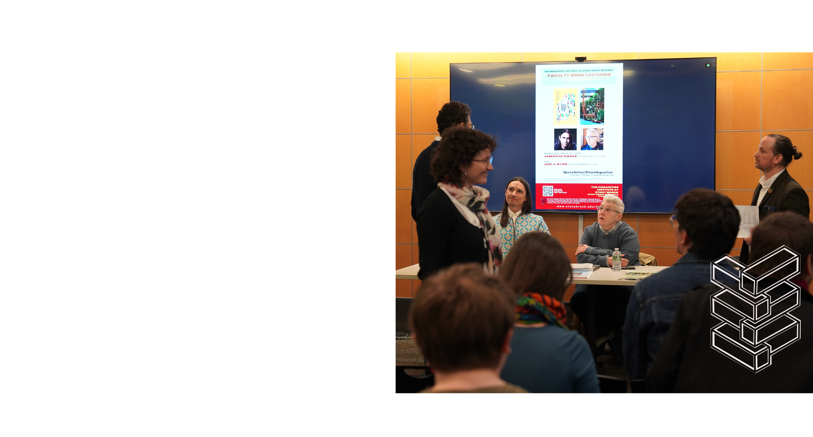 Groups of people converse in a conference setting