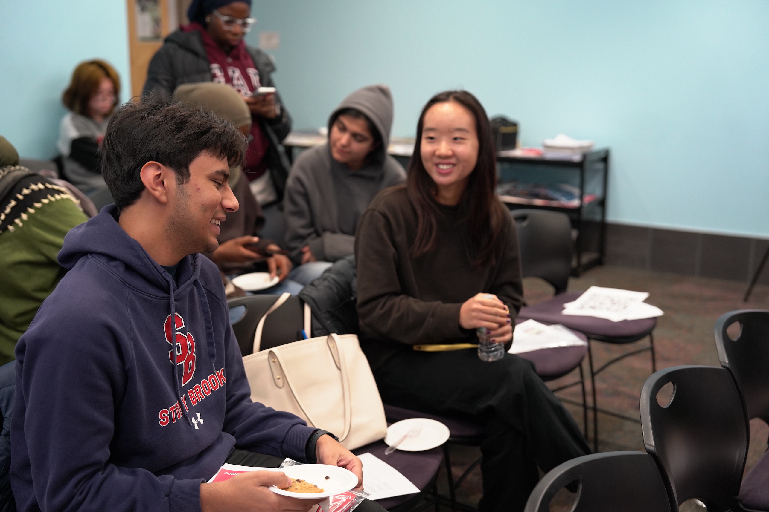 Students gathered in the E. Ann Kaplan Lecture Hall
