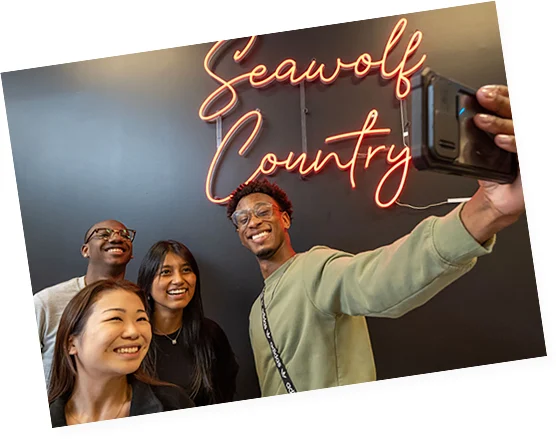 Student taking a selfie with others