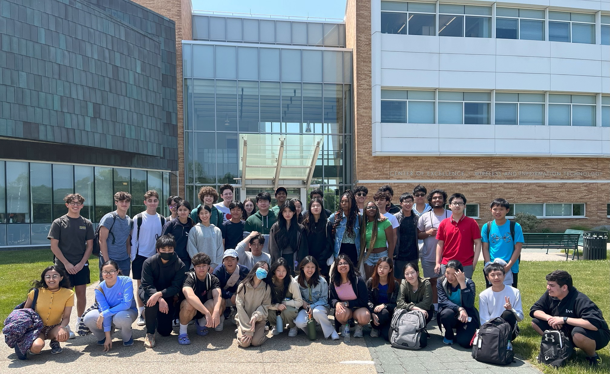 students in front of CEWIT building