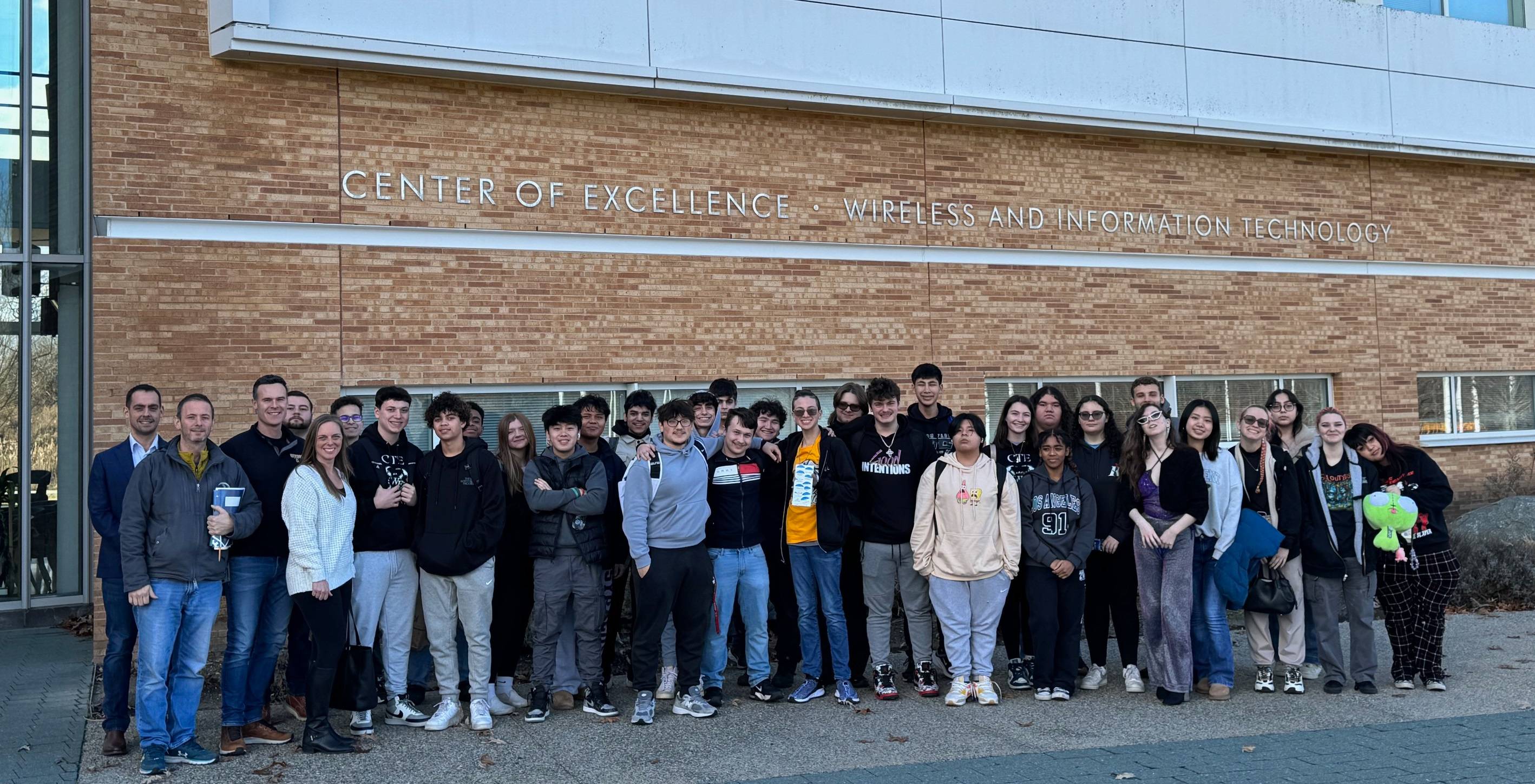 Students in front of CEWIT building