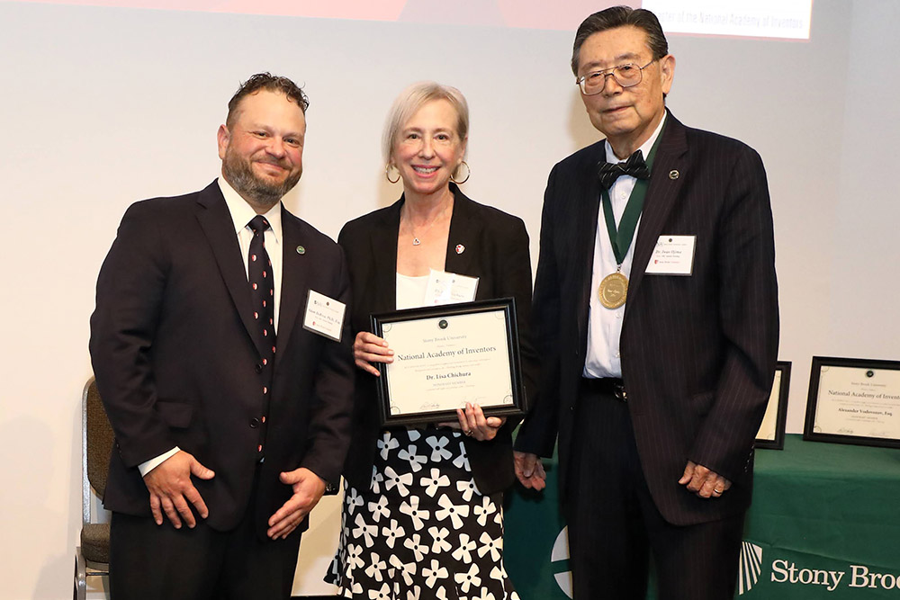 Iwao Ojima and Adam Derosa with Lisa Chichura