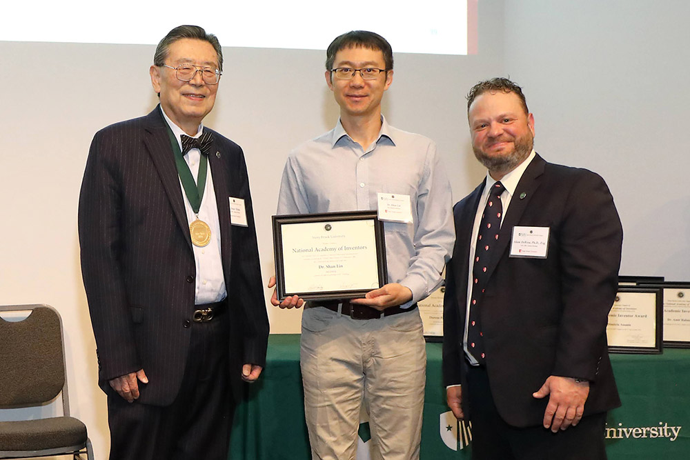 Iwao Ojima and Adam Derosa with Shan Lin