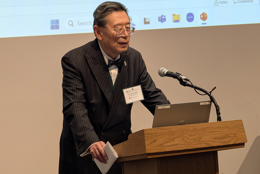 Iwao Ojima, PhD at podium