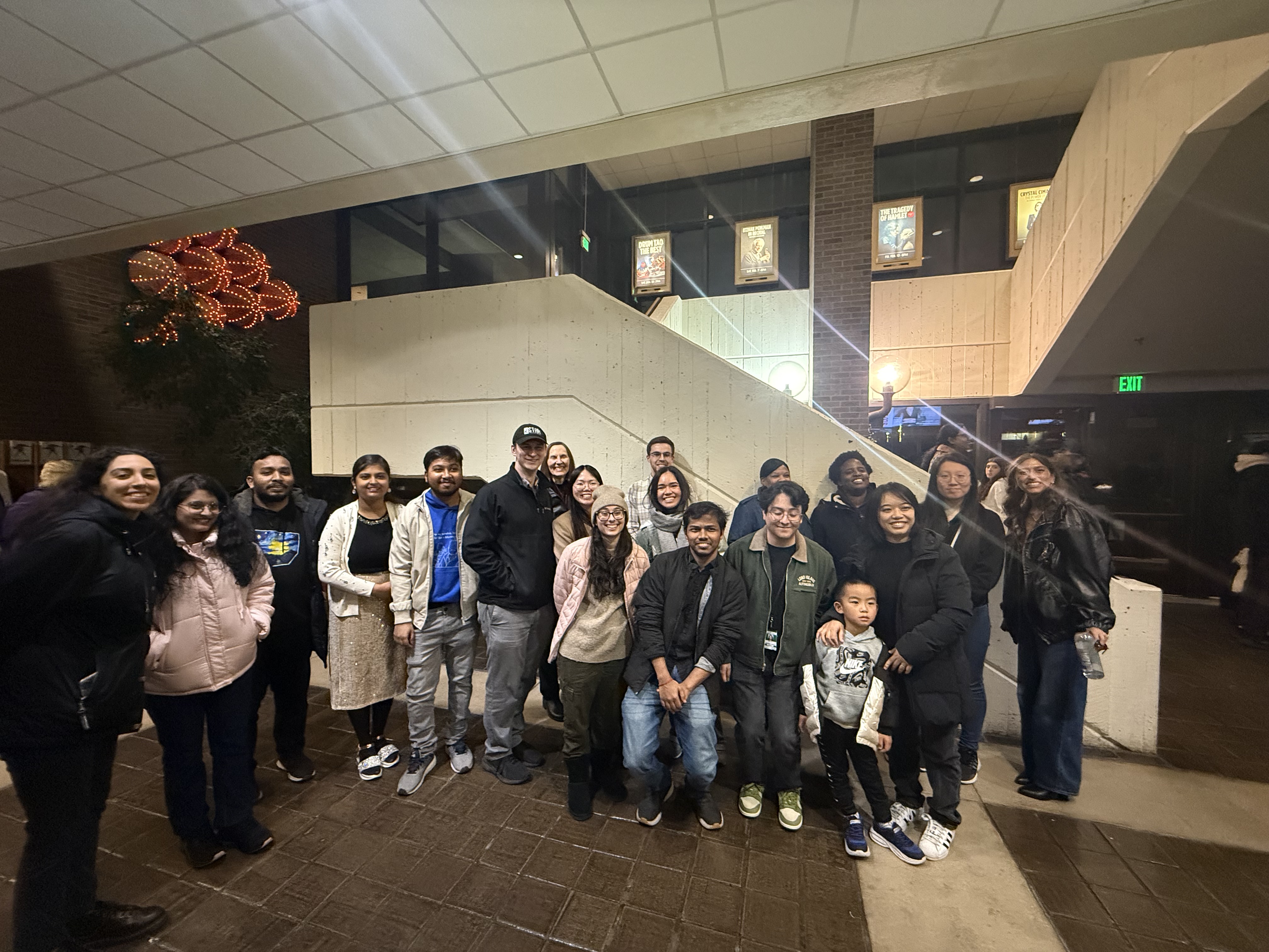 Group of people posing for photo